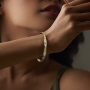 Toned Trump Gold Bangles